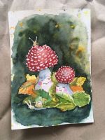 Mushrooms and autumn leaves