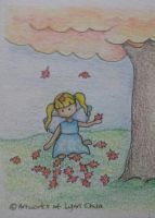 Fairy playing in autumn leaves